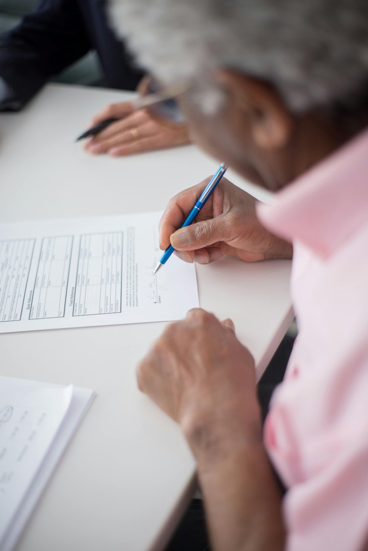 Person signing an official document
